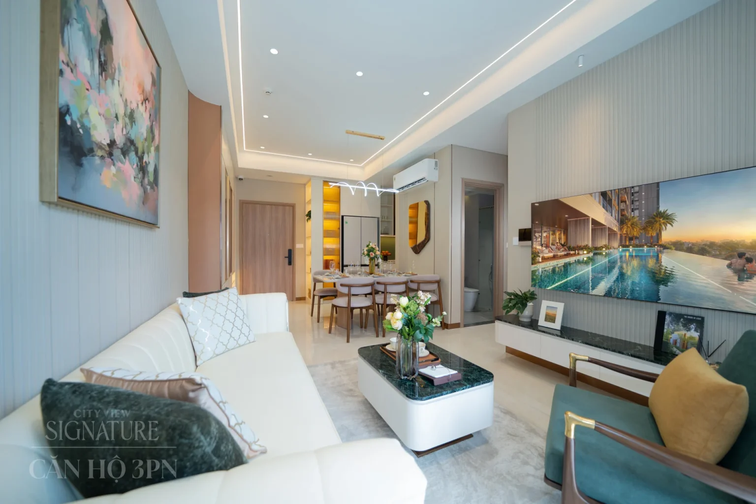 Khu vực sinh hoạt chung tập trung vào nghệ thuật phối hợp vật liệu, sự giao thoa của các mảng tường ốp, độ sáng của hệ kính và ánh kim loại, được tôn lên bởi hệ thống chiếu sáng thông minh tạo ra một tổng thể hài hòa, vừa hiện đại vừa ấm cúng.